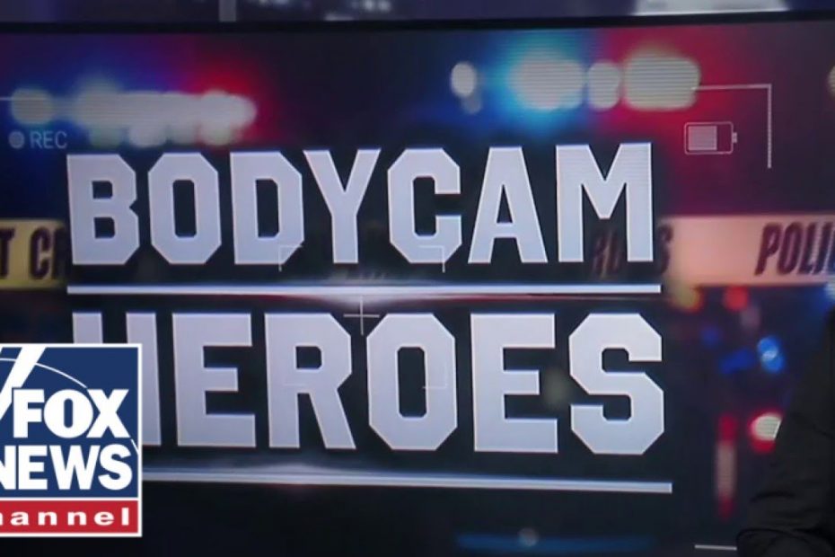 Bodycam footage shows police officers rescue two children from burning home