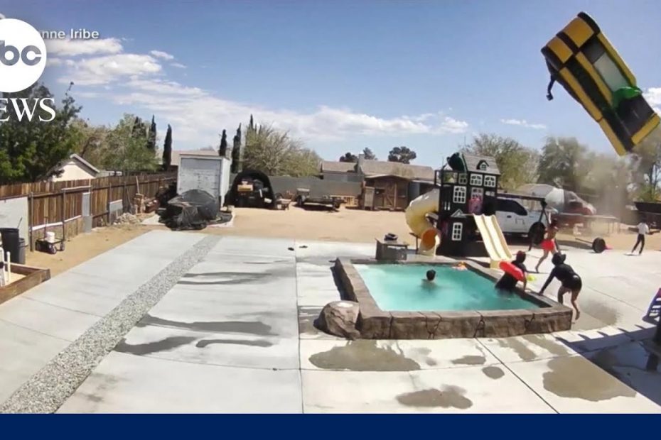 Dust devil caught on camera carrying away bouncy house