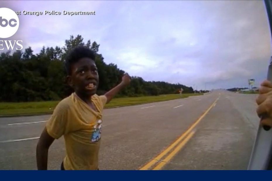 Body camera footage shows woman rescued from submerged car after son flags down police