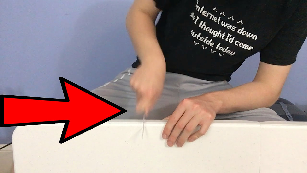 CUTTING TABLE IN HALF WITH PLASTIC KNIVES