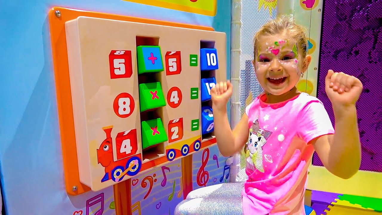 Diana and Roma interact with fun exhibits at the children’s museum in Dubai