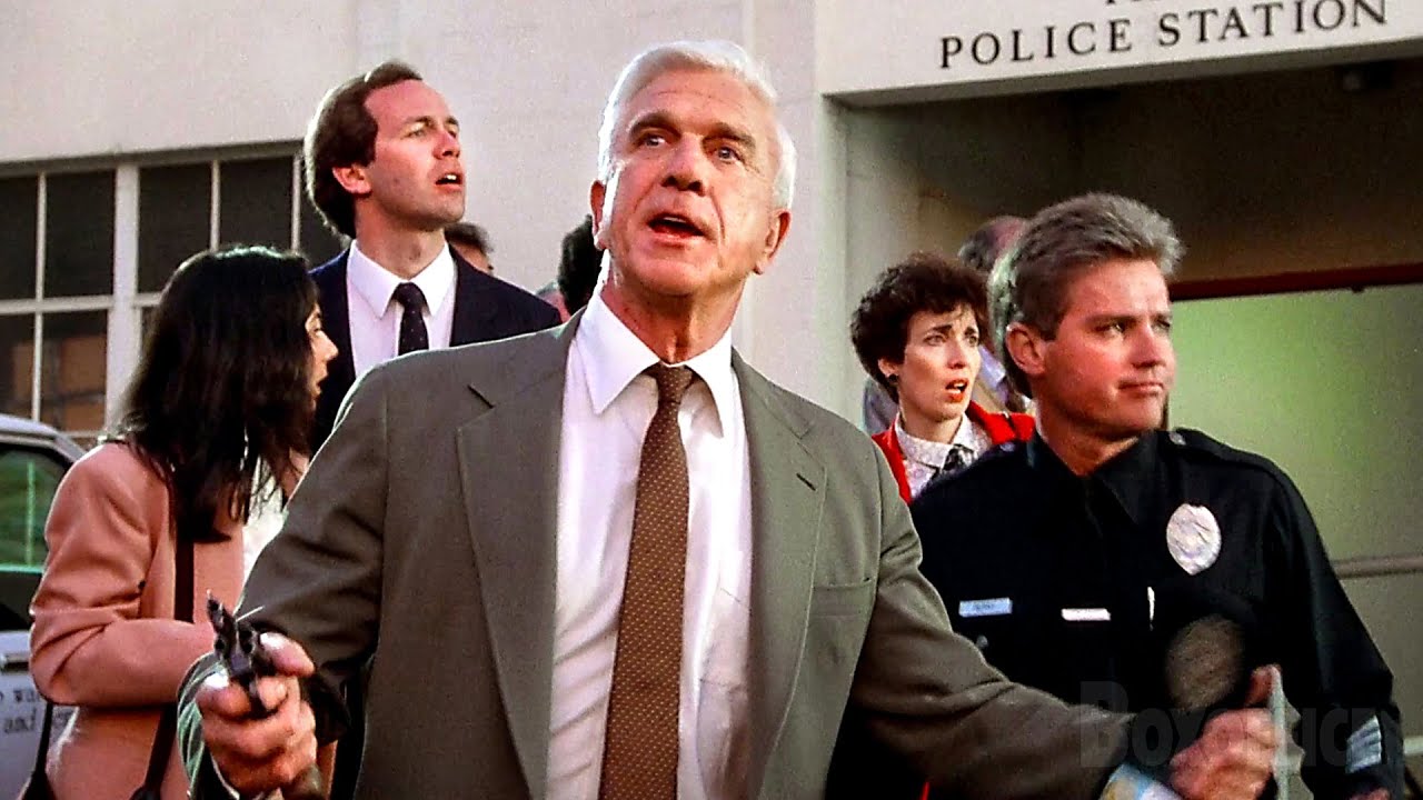 Mistaken Cop tries to shoot his own car | The Naked Gun: From the Files of Police Squad! | CLIP